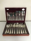 A silver plated canteen of cutlery by Cooper Ludlam