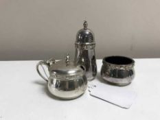 A Lindisfarne silver three piece cruet set by Reids