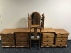 A pine dressing table and pair of bedside chests