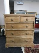 A pine five drawer chest