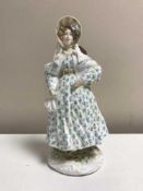 A Royal Worcester figure - Walking our dresses of the 19th century - The Romantic