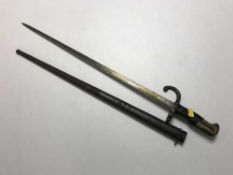A late 19th century French bayonet in scabbard