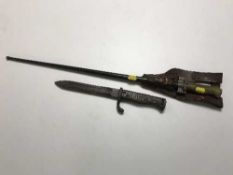 A WWI spike bayonet in scabbard with holster and a smaller bayonet of the same period