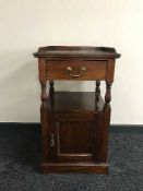 A Victorian style bedside stand