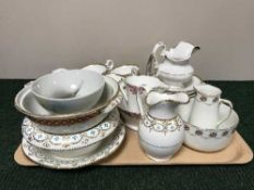 A tray of antique gilded tea china, oriental bowl,