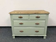 A painted pine four drawer chest