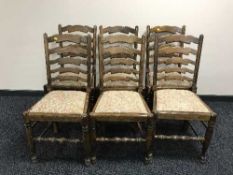 Six oak ladder back country chairs