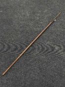 A 19th century African spear head, upon a later haft, length 176cm.