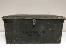 An antique canvas lined wooden trunk