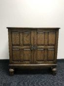 An oak double door cabinet