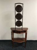 An inlaid d-shaped side table and a cake stand