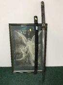 An antique samurai sword in scabbard and a monochrome print of an angel