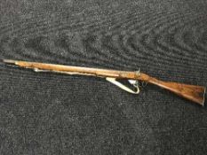 An early 19th century Tower percussion cap musket, the 84cm barrel with proof marks,