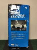 A Universal dog guard and two fur stoles