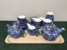 A tray of Ringtons blue chintz china, teapots,