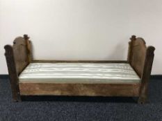 A small oak day bed