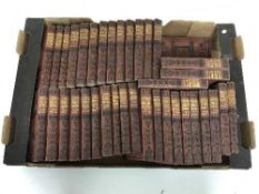 A box of Thomas Carlyle novels