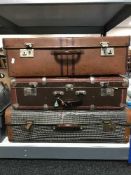 Three vintage suitcases