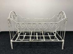 An antique French painted cot