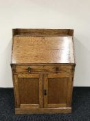 An Edwardian oak bureau