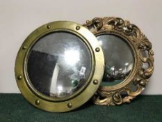 An antique un-framed mirror,