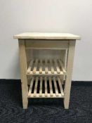 A beech two tier chef stand