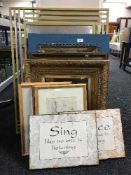 A metal framed mirror, pictures of a dog,