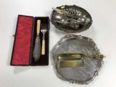 A tray of plated tray, cutlery, swing handled basket,