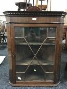 A Victorian hanging corner cupboard