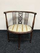 An inlaid mahogany beech wood tub chair