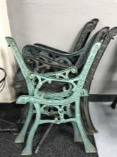 Four pairs of metal garden bench ends