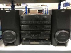 A four piece Aiwa stereo system and a pair of Sony speakers