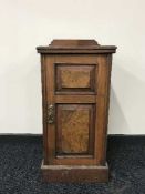 A Victorian walnut bedside cabinet
