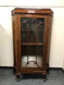 A continental mahogany display cabinet