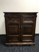An oak Old Charm TV cabinet