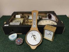 A box of clocks, carriage clocks, two glass paperweights,