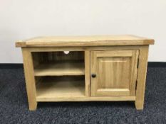 A light oak entertainment stand