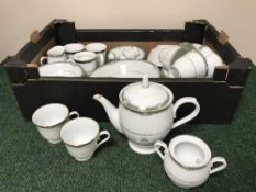A collection of Noritake dinner ware