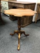 A yewwood pedestal table