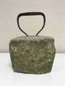 An antique boot scraper on lime stone block