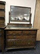 An Edwardian oak dressing chest