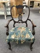 A Victorian mahogany bedroom armchair