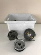 A box of assorted fishing reels