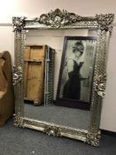 An antique style large silvered mirror,