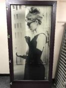 A glazed internal door depicting Audrey Hepburn,