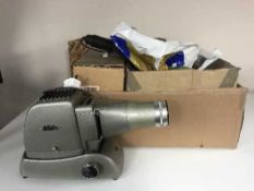 Five boxes of assorted photographic and projector equipment - lights, screens,