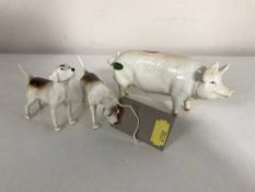 Three small Beswick figures - two beagles and a pig