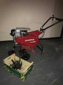 A Honda GC 160 petrol rotavator and box of blades