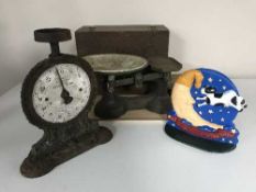 A tray of wooden box, two sets of weighing scales,