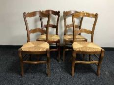 Nine rush seated kitchen chairs
